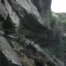 Akumersu Waterfalls Reveal Huge Rock Cliff Man Stands On Rocks